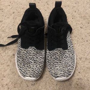 Black and white GBX sneakers